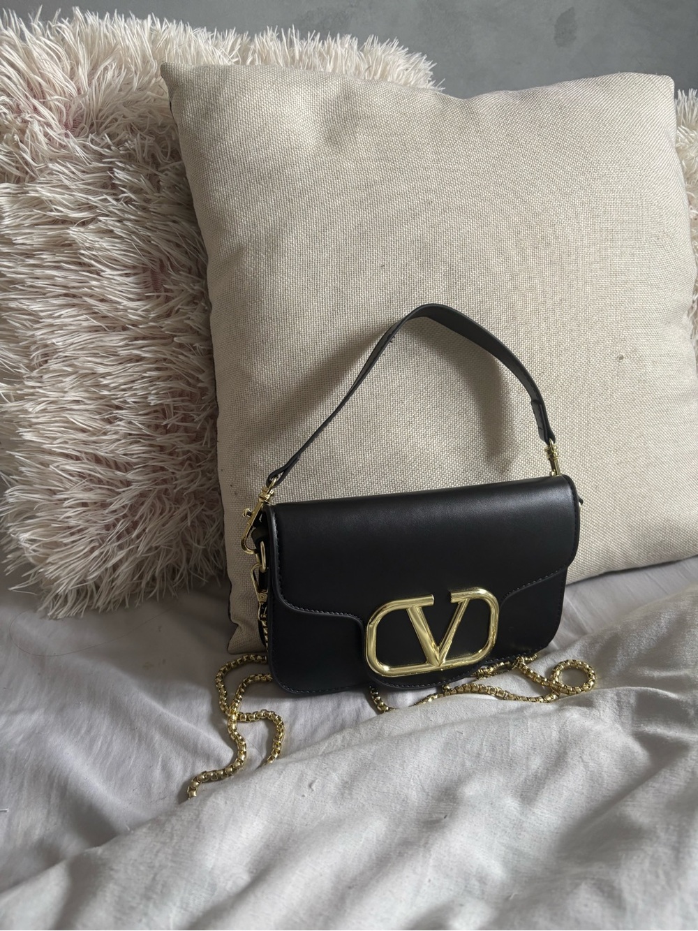 Black Leather Shoulder Bag with Gold Accent